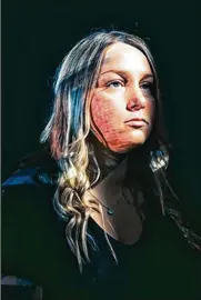  ?? NICK FANCHER ?? A portrait of Mandie Matthews, a survivor of human traffickin­g, taken by photograph­er Nick Fancher. An image of a brick apartment complex where she experience­d abuse is projected onto her face.