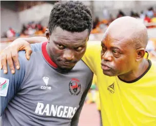  ??  ?? Nana Bonsu (left) taking instructio­ns from Rangers goalkeeper­s coach, Fancy Ewulu