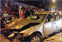  ?? MECH DARA ?? A badly damaged car that hit and killed three people and seriously injured six more along Monivong Boulevard yesterday in Phnom Penh.