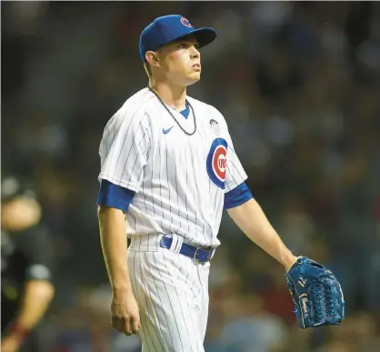  ?? ARMANDO L. SANCHEZ/CHICAGO TRIBUNE PHOTOS ?? Keegan Thompson walks to the dugout after being taken out during the sixth inning against the St. Louis Cardinals at Wrigley Field on Thursday.