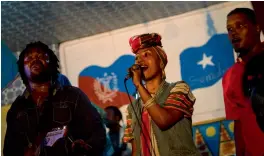  ?? — AFP ?? Sudanese singer Alsarah performs with the Kenyan band Afro-Simba at the Internatio­nal Solidarity Concert as part of the Mogadishu Music Festival in Somalia’s capital.