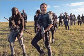  ??  ?? Michonne (Danai Gurira) and Rick Grimes (Andrew Lincoln) lead a band of survivors in the climax of the war with Saviors in the Season 8 finale of “The Walking Dead.”