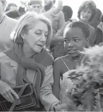  ??  ?? SHOWING SOLIDARITY: Nadine Gordimer was among about 300 white liberals who visited Alexandra on May 18 1986 to lay wreaths at the grave of victims of political unrest