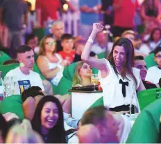  ?? Antonin Kélian Kallouche/Gulf News ?? A Croatian supporter cheers as her team made it to the final of the World Cup at the Atlantis World Cup Fan Zone.