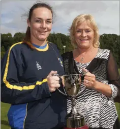  ??  ?? Annmarie Burke and Sharon Fox with the Dave Fox Memorial Cup at the Dave Fox Memorial Day. Photo: Garry O’Neill
