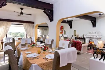  ??  ?? The dining area at Mihir Garh.