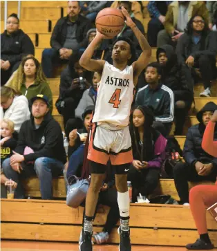  ?? STEVE JOHNSTON/DAILY SOUTHTOWN ?? Shepard’s Jermell Lymon puts up a 3-point shot against Evergreen Park during a South Suburban Red game in Palos Heights on Friday.