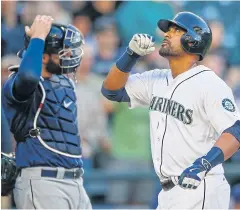  ?? AFP ?? The Mariners’ Franklin Gutierrez crosses home plate after hitting a two-run home run.
