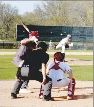  ?? Mark Humphrey/Enterprise-Leader ?? Farmington sophomore Sam Kirkman pitches against Clarksvill­e during a nonconfere­nce baseball game on Monday, April 10. The Cardinals lost 8-4.