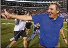  ?? JONATHAN BACHMAN / GETTY IMAGES ?? Coach Dan Mullen and the Gators’ offense are doing enough to complement a stout defense.