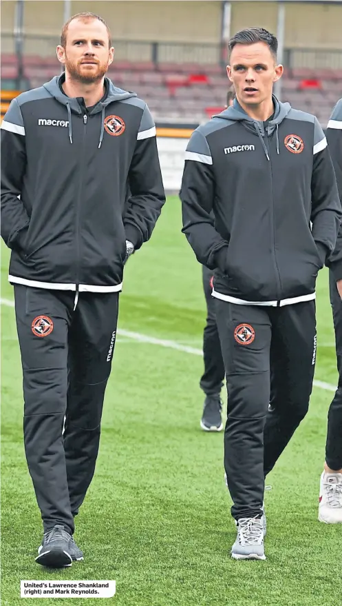  ??  ?? United’s Lawrence Shankland (right) and Mark Reynolds.