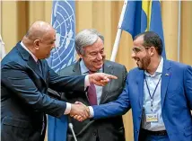  ?? AP ?? Head of delegation for rebel forces known as Houthis, Mohammed Abdulsalam, right, and Yemen Foreign Minister Khaled al-Yaman, left, shake hands together with UN Secretary General Antonio Guterres, during the Yemen peace talks closing press conference at the Johannesbe­rg castle in Rimbo, north of Stockholm, Sweden.