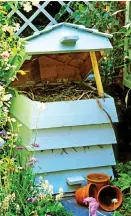  ?? ?? SWEET: A beehive-style bin can be more attractive in the garden