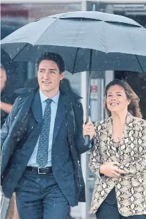  ?? ADRIAN WYLD THE CANADIAN PRESS ?? Justin Trudeau and his wife Sophie Gregoire Trudeau. Trudeau was the focus of rumours about his time at a Vancouver school.