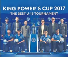  ??  ?? Aiyawatt Srivaddhan­aprabha, standing third right, at yesterday’s news conference to announce this year’s U15 King Power’s Cup.