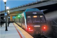  ??  ?? A SMART train leaves Novato-San Marin Station. The rail service gave thousands of free rides during October’s fires.