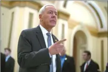  ?? AP file photo ?? Rep. Ken Buck, R-Colo., walks out of the House chamber at the Capitol in Washington on Feb. 6, 2024. Buck announced Tuesday, that he’ll resign next week, narrowing his party’s razor-thin House majority and scrambling the already heated GOP primary to fill his Colorado seat.