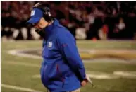  ??  ?? New York Giants head coach Tom
Coughlin looks on in the final moments
of an NFL football game against the
Baltimore Ravens in Baltimore Sunday Baltimore won
33-14.