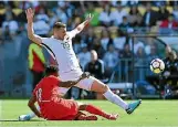  ?? PHOTO: GETTY IMAGES ?? Jefferson Farfan was shackled by Tommy Smith and the All Whites defence.