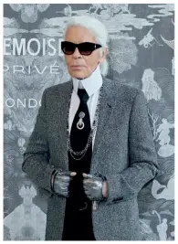  ??  ?? FOLLOW SUIT From top: Chanel No. 5 perfume comes to life in a conceptual, aromatic experience; Karl Lagerfeld at the Mademoisel­le Privé exhibition in October