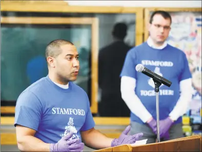  ?? Matthew Brown / Hearst Connecticu­t Media ?? Matthew Quinones, president of the Stamford Board of Representa­tives, speaks to the media following Mayor David Martin’s announceme­nt of “Stamford Together,” a citywide volunteer program to help support the emergency response efforts related to the COVID-19 pandemic, during a press conference at the Stamford Government Center on Wednesday. Quinones and fellow city representa­tive Benjamin Lee have been tasked with helping launch the program.