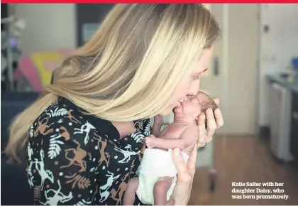  ??  ?? Katie Salter with her daughter Daisy, who was born prematurel­y.