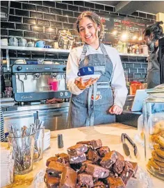  ?? ?? BREWING UP SKILLS: Madi Salins at the cafe, Sandeep Salins and Dominic Glasgow.