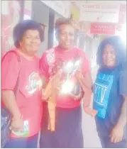  ?? Picture: SERAFINA SILAITOGA ?? Macuata women’s rugby team coach Motu Lalagavesi (right) with manager Maria Kaukimoce hold the trophy they won from Sigatoka.