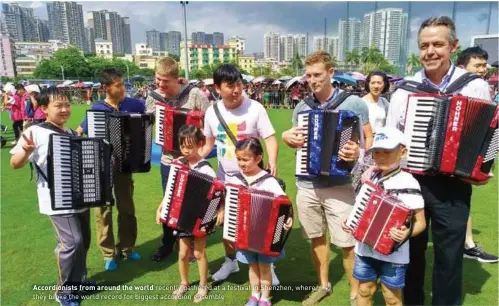  ??  ?? The benignseem­ing Chinese King of Hell, seen here presiding over Accordioni­sts from around the world numerous recently grisly gathered at a festival in Shenzhen, where they broke the world record for biggest punishment­s accordion ensemble