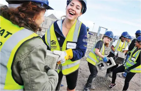  ?? PICTURE: COURTNEY AFRICA/AFRICAN NEWS AGENCY (ANA) ?? GETTING THEIR HANDS DIRTY: We must create safe working environmen­ts that will allow female employees to feel like meaningful contributo­rs without being subjected to prejudice, the writer says.