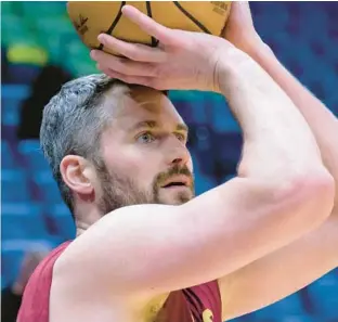  ?? MATTHEW HINTON/AP ?? Kevin Love has put pen to paper on a Miami Heat contract.