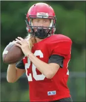  ??  ?? Haskell Harmony Grove sophomore quarterbac­k Carson Humphrey prepares to throw the ball.