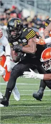  ?? PETER POWER THE CANADIAN PRESS ?? Bralon Addison nears the end zone last week against B.C.