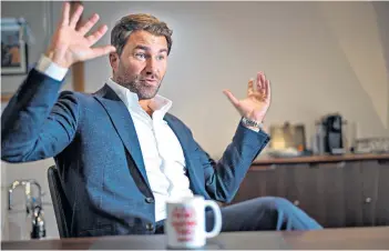  ??  ?? Grand plans: Eddie Hearn (left) has spent £5 million creating ‘Matchroom Square Garden’ – a training camp and fight centre built in the grounds of his home in Brentwood, Essex