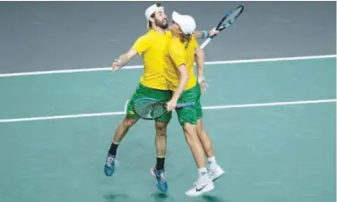  ?? Agence France-presse ?? ↑
Australia’s Jordan Thompson (left) and Max Purcell celebrate after winning the doubles match against Croatia on Friday.