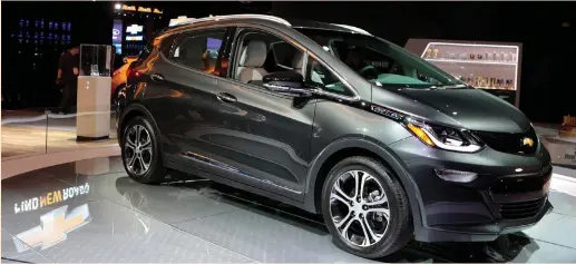  ?? (Rebecca Cook/Reuters) ?? A 2018 Chevrolet Bolt EV is displayed during the North American Internatio­nal Auto Show in Detroit last year.