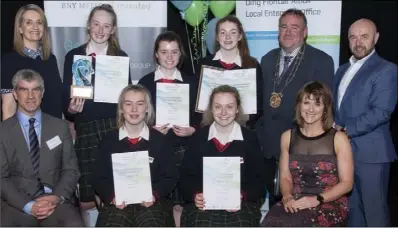  ??  ?? Runners-up in the Senior section,Truffle Shuffle, from Coláiste Bríde, Enniscorth­y (from left) back – Natasha Hughes (BNY Mellon), Cora Redmond, Aine Byrne, Polly Frost, Keith Doyle, Cathaoirle­ach, Wexford County Council, and Brendan Ennis, Wexford Enterprise Centre; front – Tom Ahern (BNY Mellon), Faye Larkin, Leah Scallan and Emer Doyle (Project Coordinato­r, LEO).