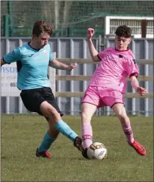  ??  ?? Ciarán Paige of Wexford F.C. tussling with Kjavs Vitkevicus.