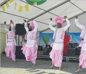  ??  ?? Left, smiles for the camera; above, 4x4 Bhangra perform
