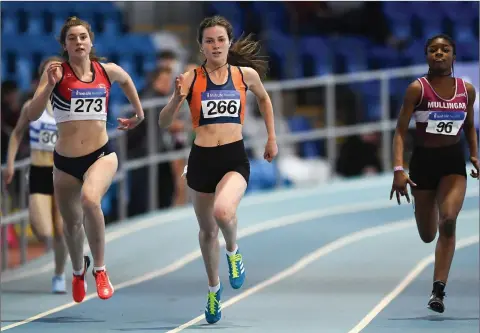  ??  ?? Alana Ryan of Sli Cualann AC (center) competing in the Junior Womens 200m during the Irish Life Health National Indoor Junior and U23 Championsh­ips at Athlone IT in Athlone, County Westmeath. Photo by Sam Barnes/Sportsfile.