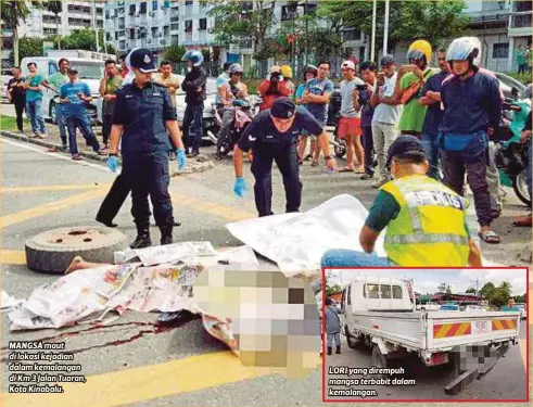  ??  ?? MANGSA maut di lokasi kejadian dalam kemalangan di Km 3 Jalan Tuaran, Kota Kinabalu. LORI yang dirempuh mangsa terbabit dalam kemalangan.