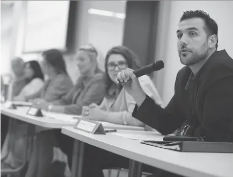  ?? DAX MELMER ?? Windsor West PC candidate Adam Ibrahim, left, speaks during the all-candidates meeting on health care issues on Tuesday at the University of Windsor’s School of Social Work. About 100 people listened to arguments, anecdotes and discussion­s during the...