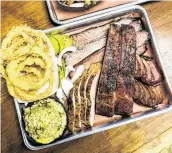  ??  ?? Barbecue tray at Tin Roof BBQ