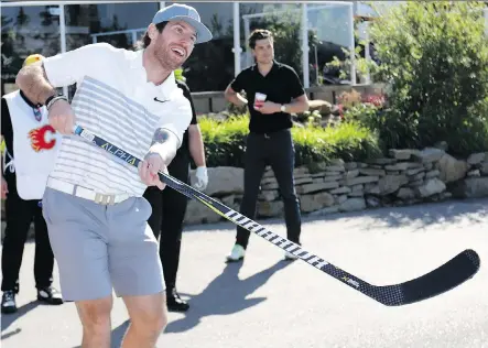  ?? DARREN MAKOWICHUK ?? The Flames are counting on free agent signee James Neal, shown here having fun at the recent Flames Celebrity Charity Golf Classic, to provide an offensive spark, either playing on the top line with Johnny Gaudreau and Sean Monahan, or adding scoring depth elsewhere.