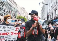  ?? Michael A. McCoy / Getty Images ?? The Wizards’ Bradley Beal marches to the MLK Memorial to mark Juneteenth and to support Black Lives Matter on Friday in Washington, D.C.