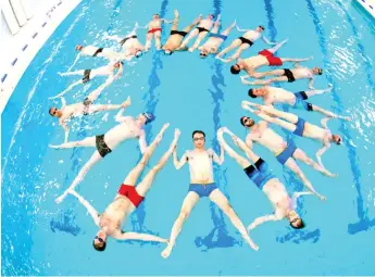  ??  ?? The team of amateurs are just tweaking their choreograp­hy before heading off to compete in next week's Men's Cup. — AFP photo