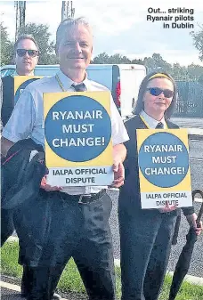  ??  ?? Out... striking Ryanair pilots in Dublin