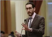  ?? RICH PEDRONCELL­I — THE ASSOCIATED PRESS FILE ?? State Sen. Scott Wiener, D-San Francisco, speaks on a measure at the Capitol in Sacramento.