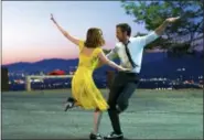  ?? DALE ROBINETTE/LIONSGATE VIA AP, FILE ?? This image released by Lionsgate shows Ryan Gosling, right, and Emma Stone in a scene from, “La La Land.” The film is nominated for an Oscar for best feature film. The 89th Academy Awards will take place on Feb. 26.