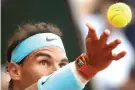  ?? Alessandra Tarantino/Associated Press ?? ■ Spain's Rafael Nadal plays a shot against Austria's Dominic Thiem in the men's final match of the French Open tennis tournament at the Roland Garros stadium Sunday in Paris.